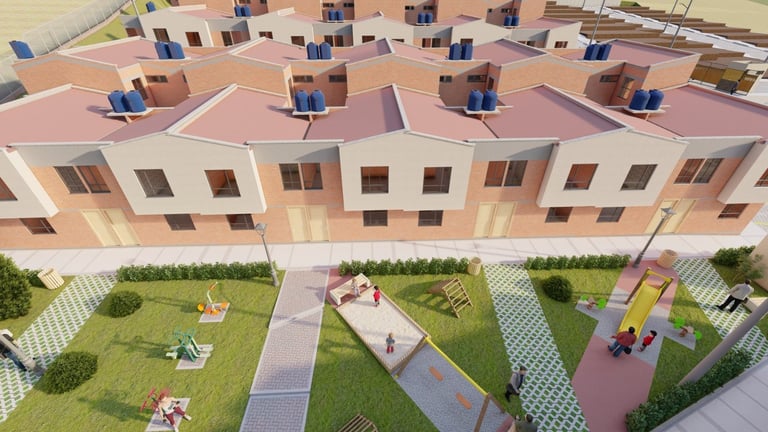 Aerial view of a residential housing complex with identical pink/terracotta townhouses arranged in rows, featuring landscaped courtyards with green spaces and pathways